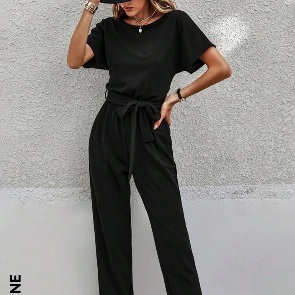 Black jumpsuit with belt